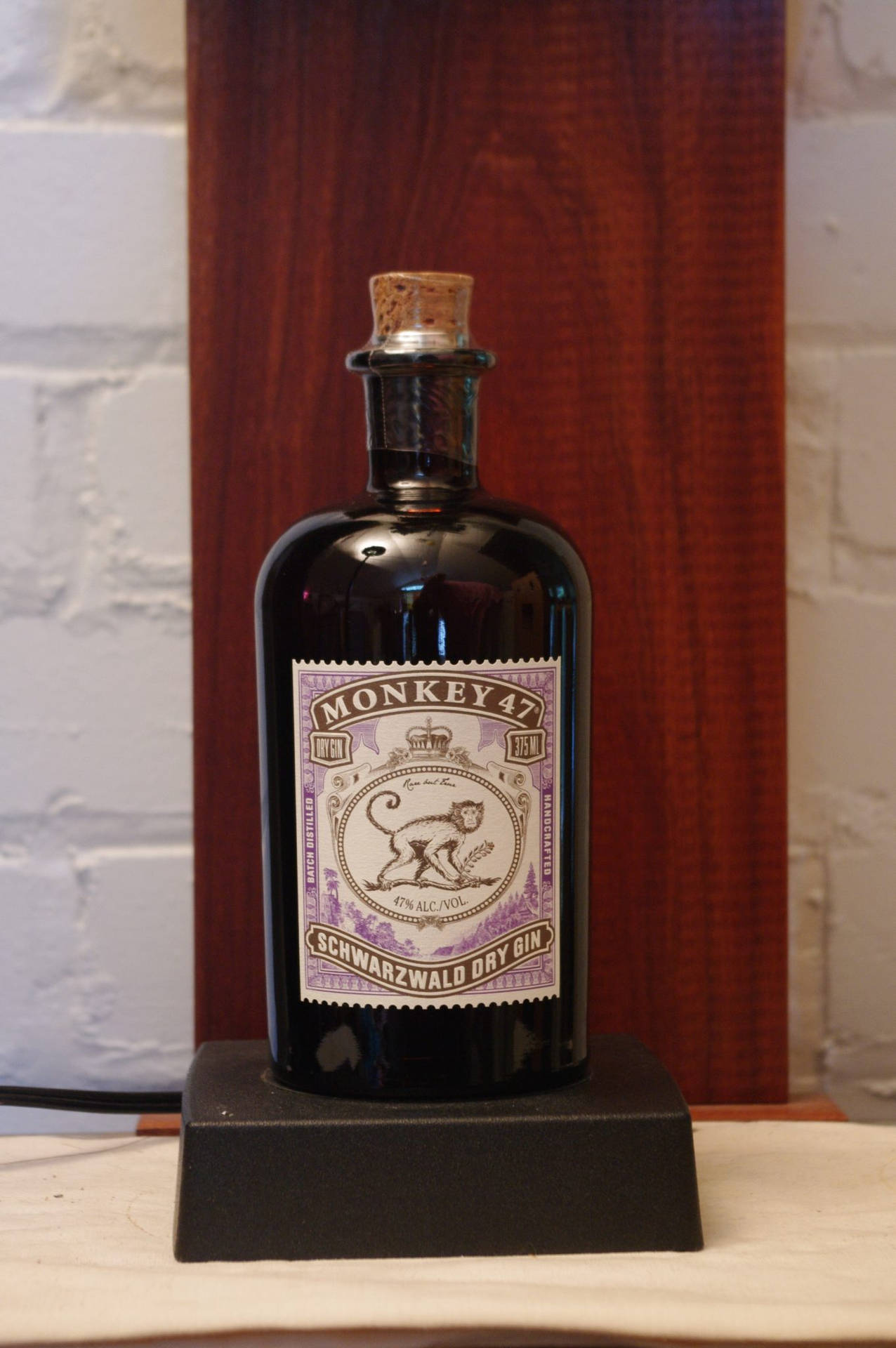 Monkey 47 Gin Schwarzwald Dry Bottle Display Background