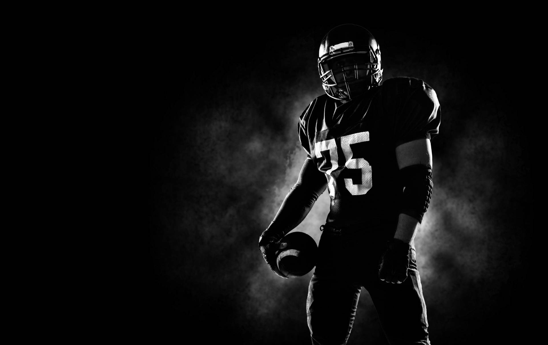 Monochromatic College Football Player Background