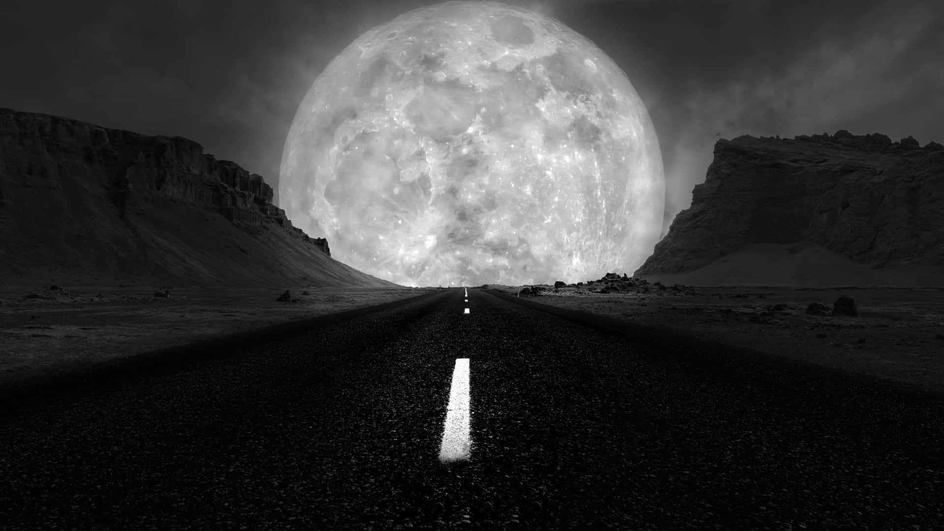 Monochrome_ Desert_ Road_ Under_ Giant_ Moon.jpg Background