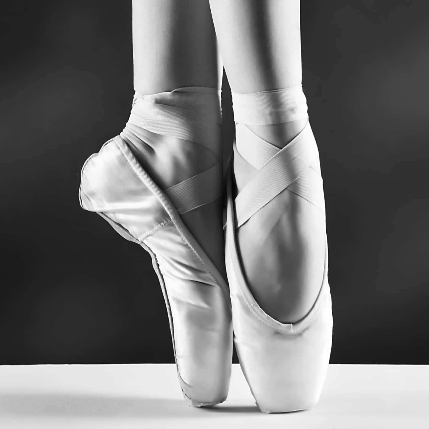Monochrome Elegance Of Pointe Ballet Shoes Background