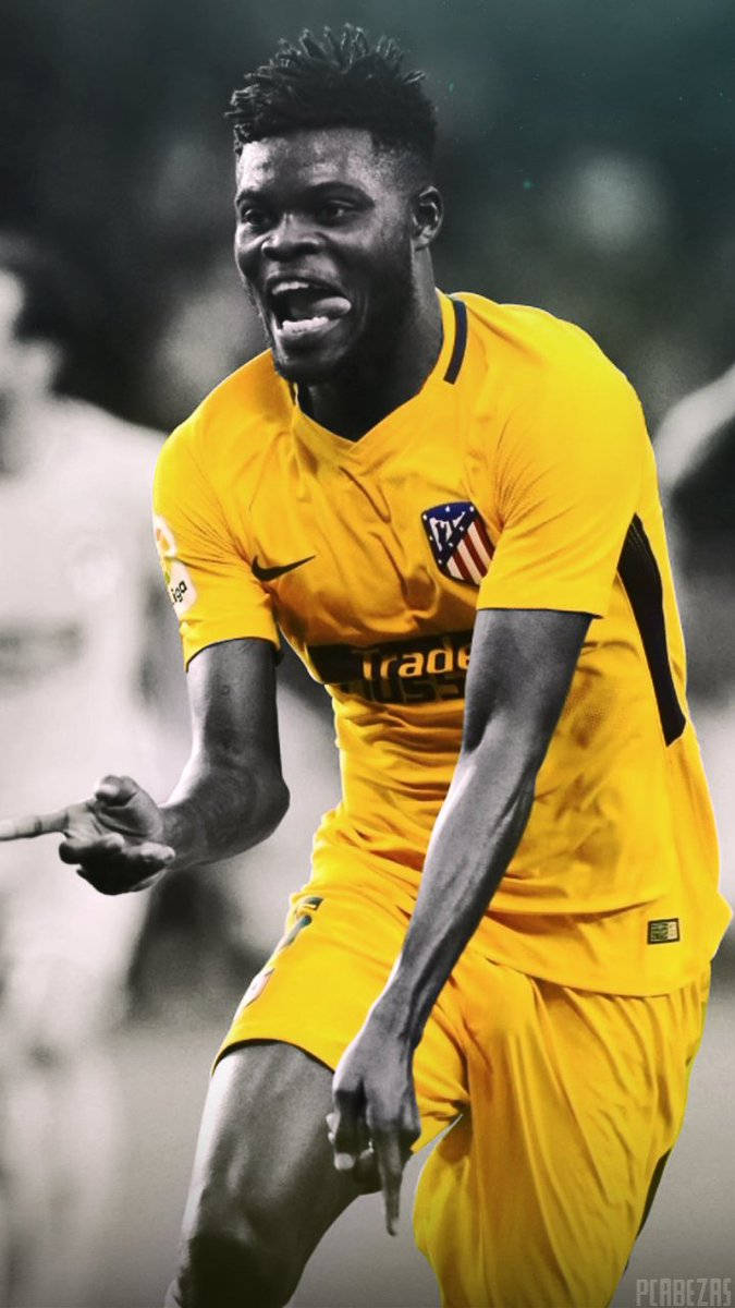 Monochrome Filter Thomas Partey In A Yellow Uniform Background