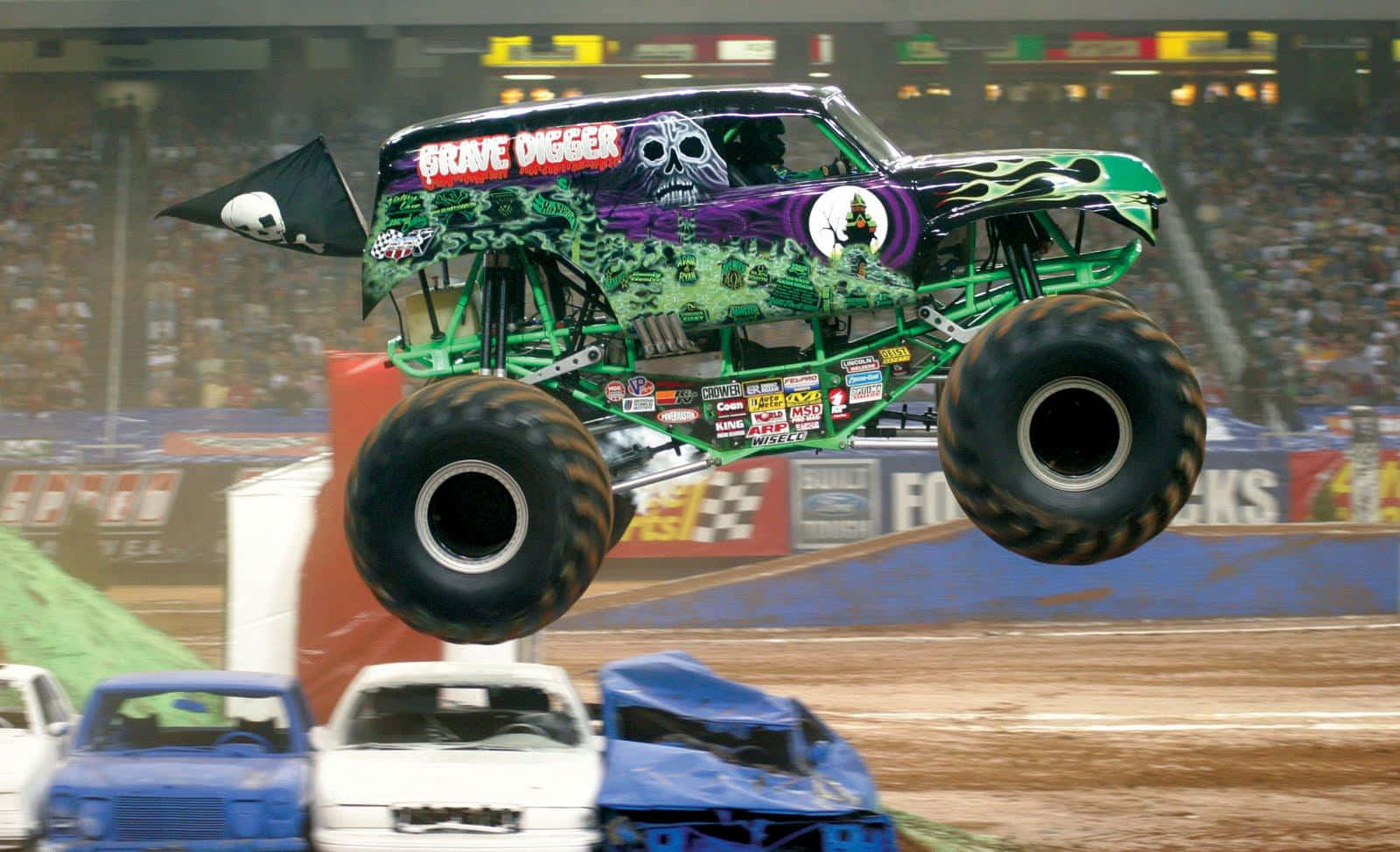 Monster Truck Smashes Blue And White Cars