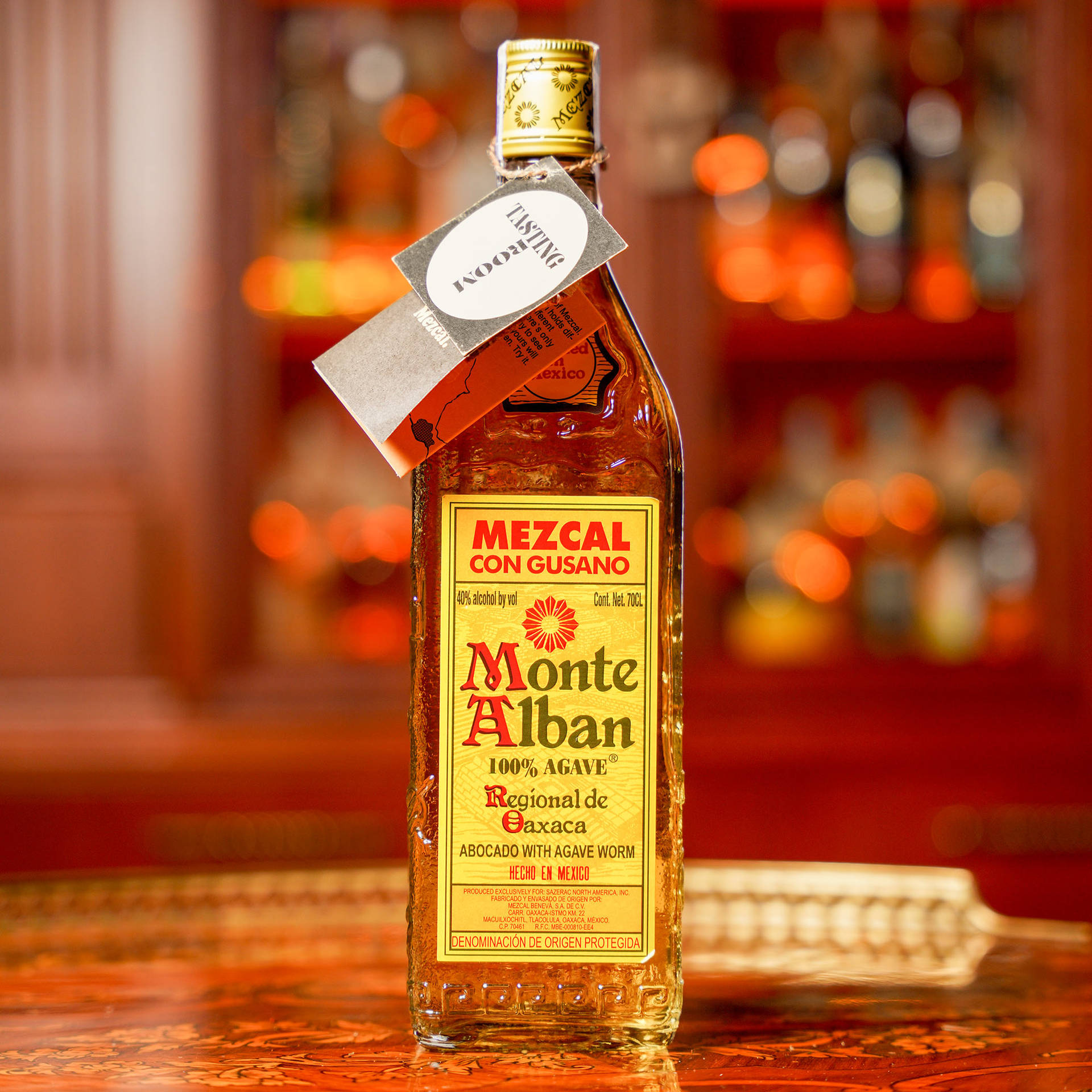 Monte Alban Mezcal Tequila Elegantly Displayed On Wooden Table Background