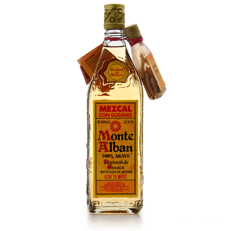 Monte Alban Mezcal Tequila With Agave Worms Background