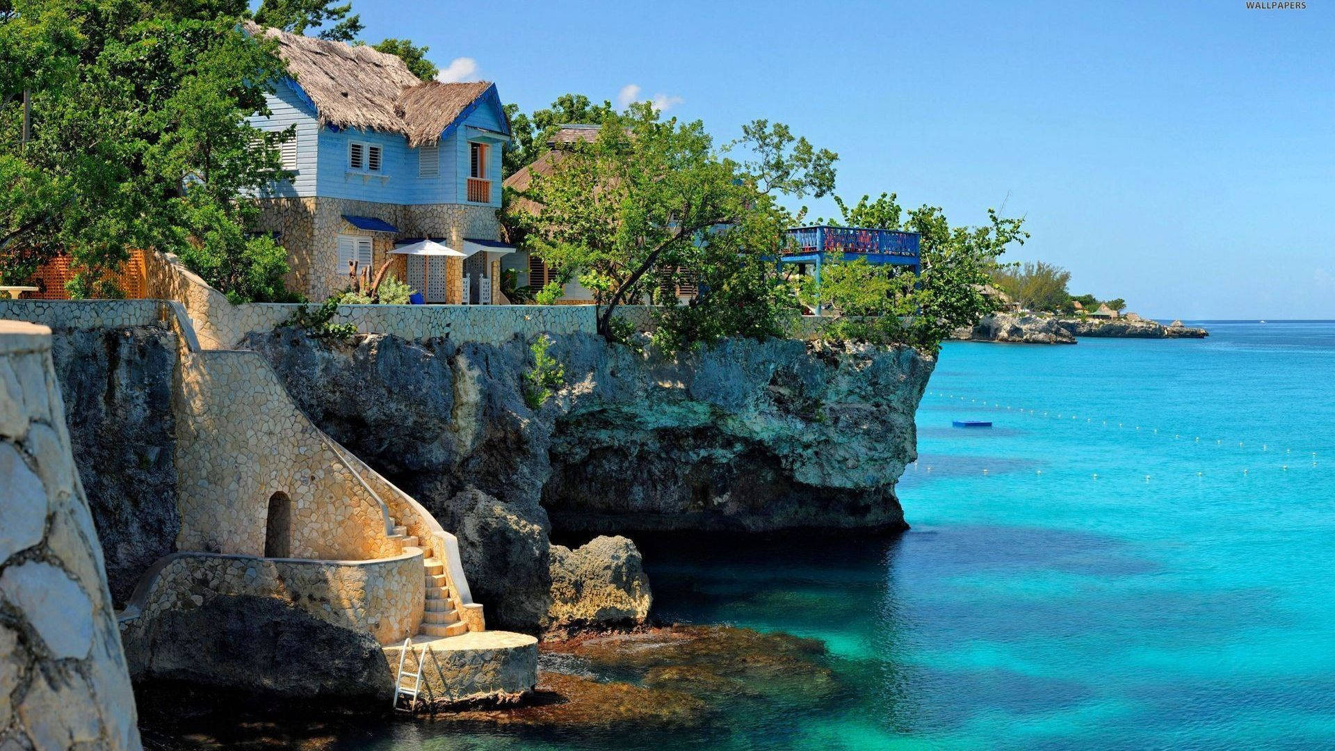 Montego Bay House On A Cliff Background