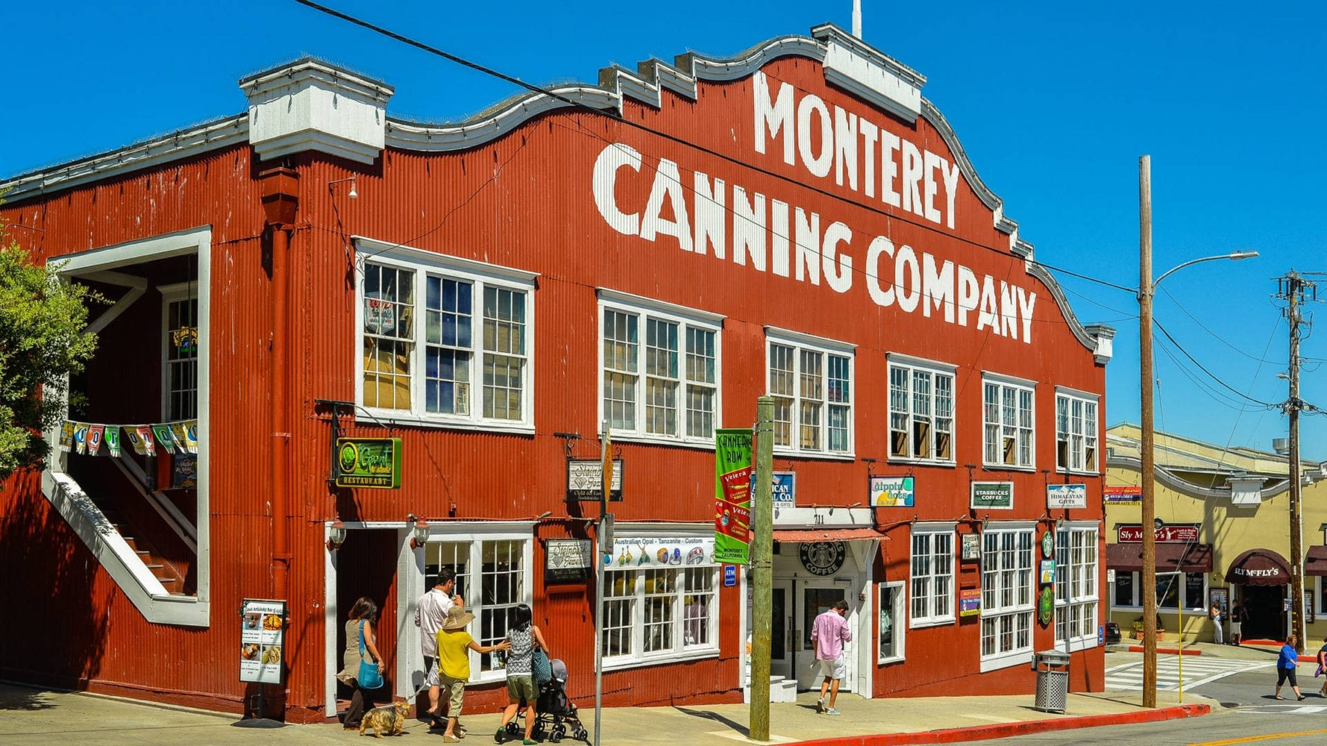 Monterey Canning Building In Cannery Row Background