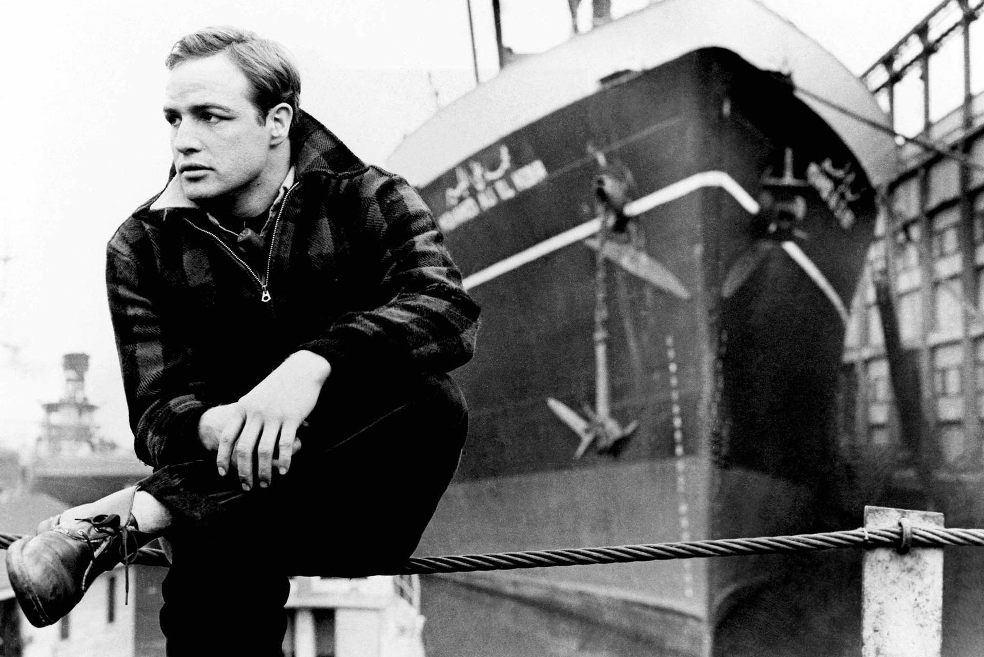 Montgomery Clift Chillin By The Ship Yard Background