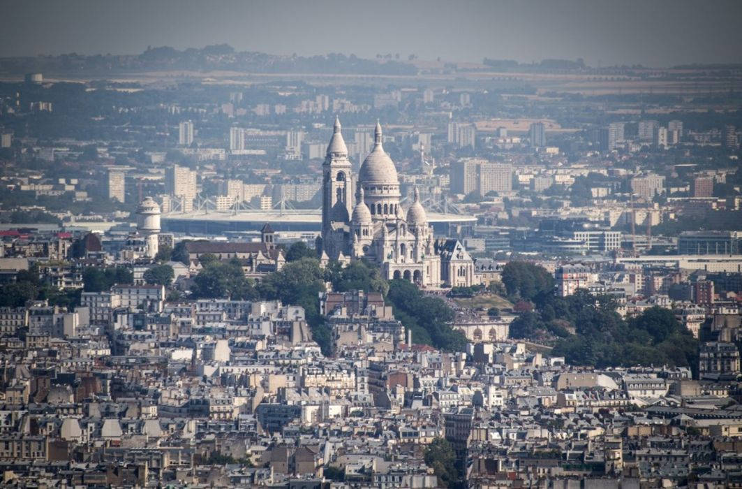 Montmartre Neighborhood With Sacre Coeur Background