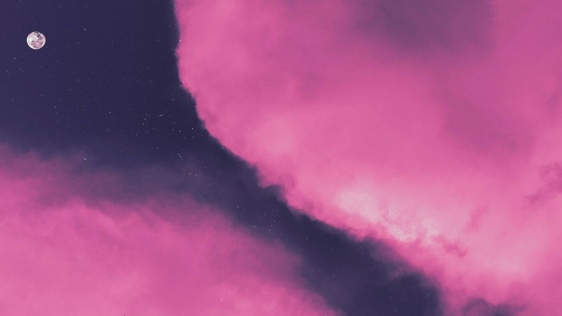 Moon Amid Pink Cloud Background