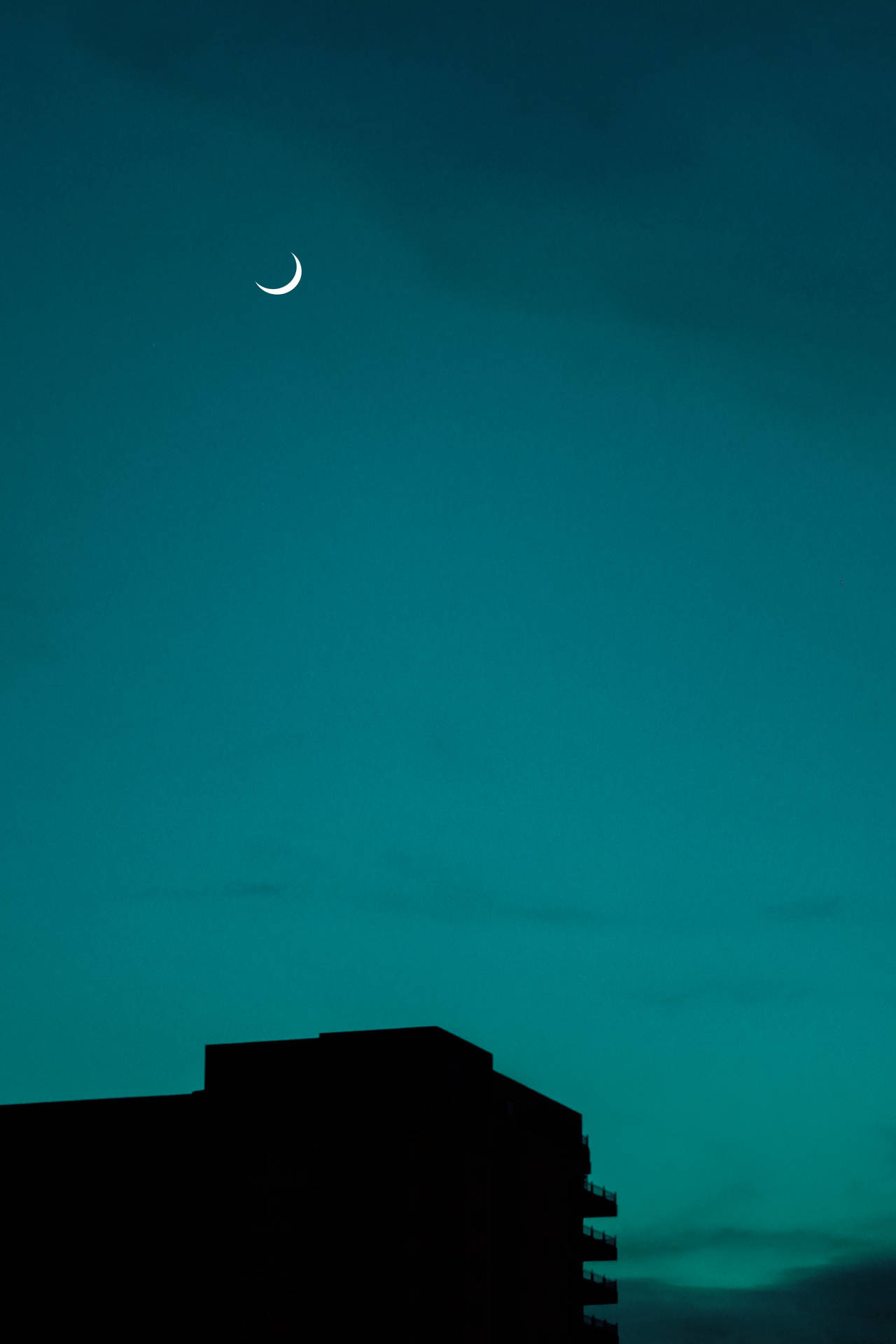 Moon And Teal Sky Background