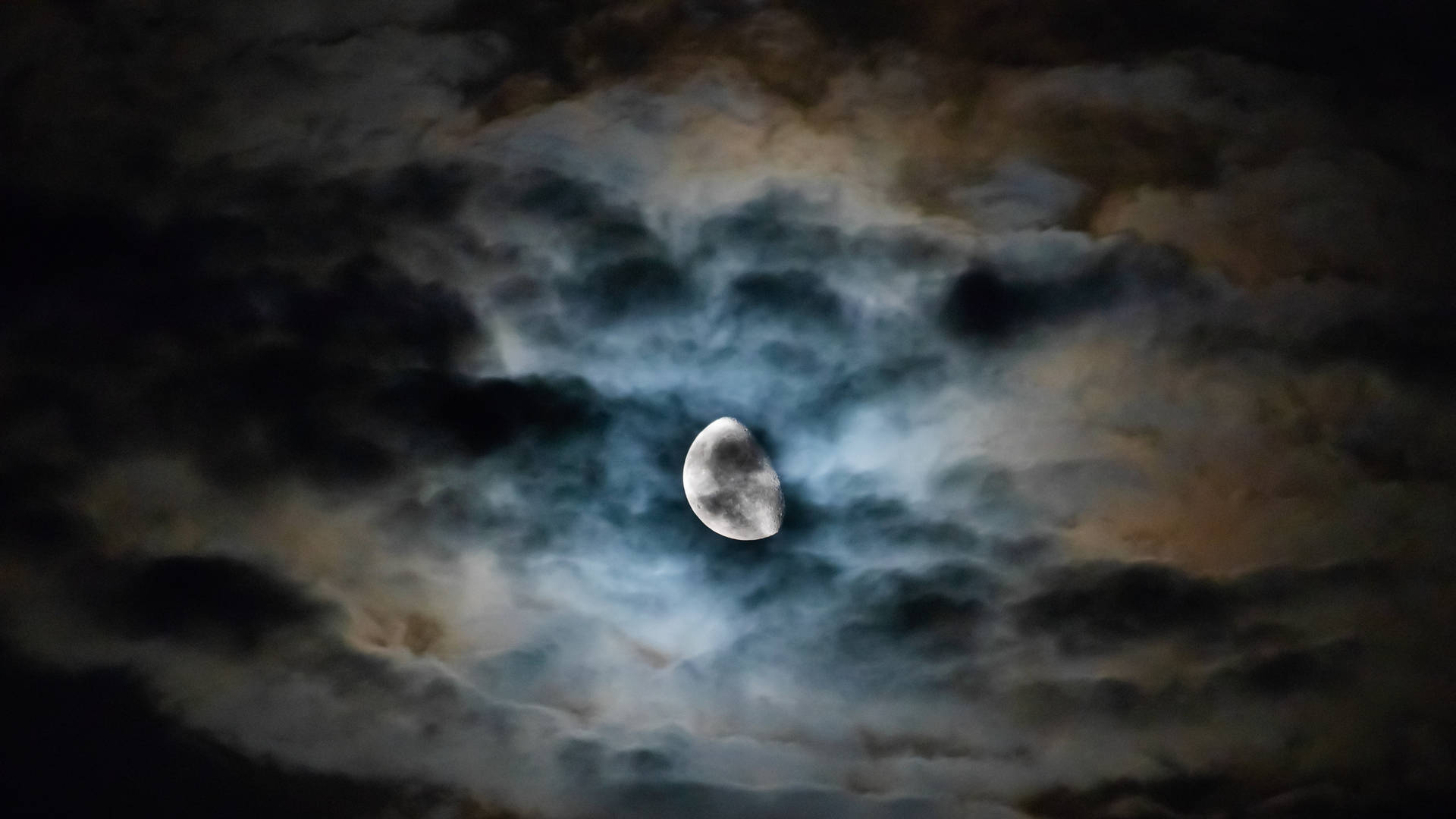 Moonlight 4k Behind Dark Clouds Background