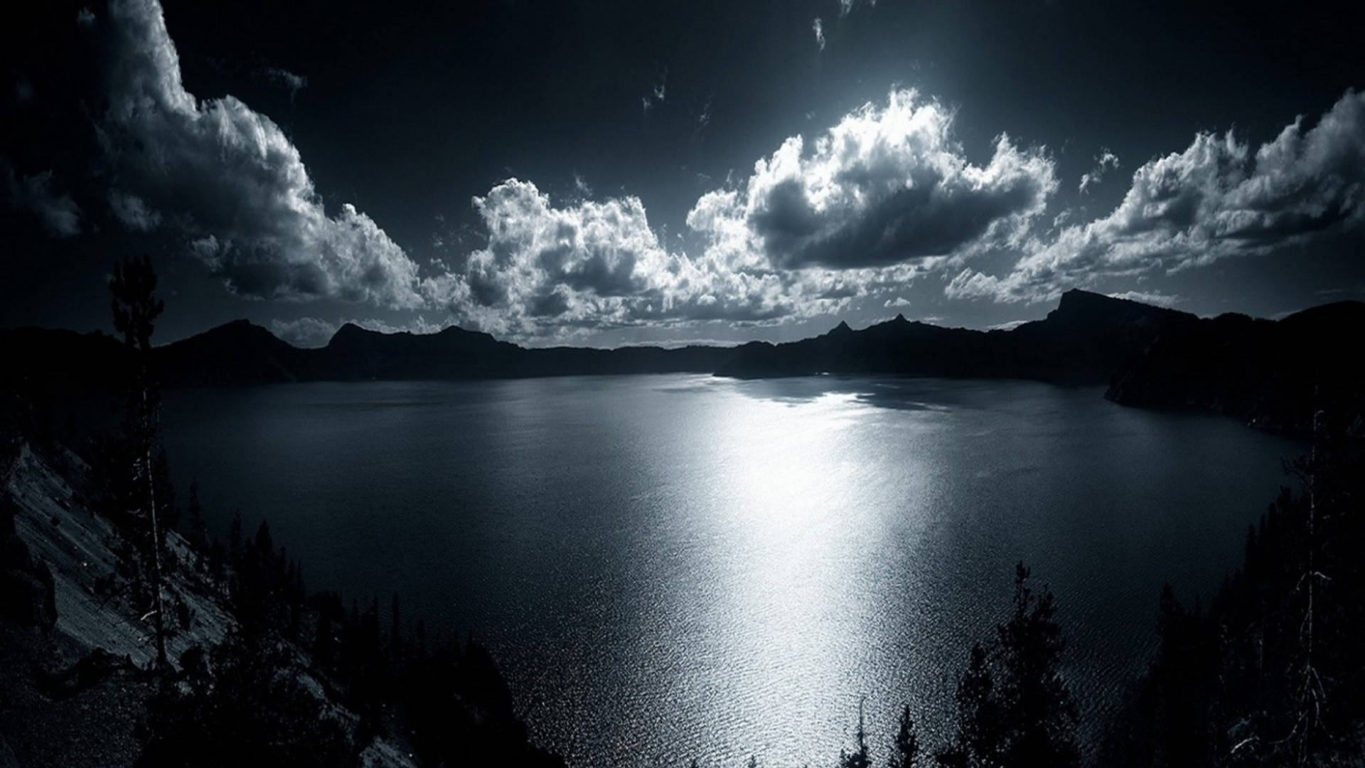 Moonlight Over A Mountain And Water Background