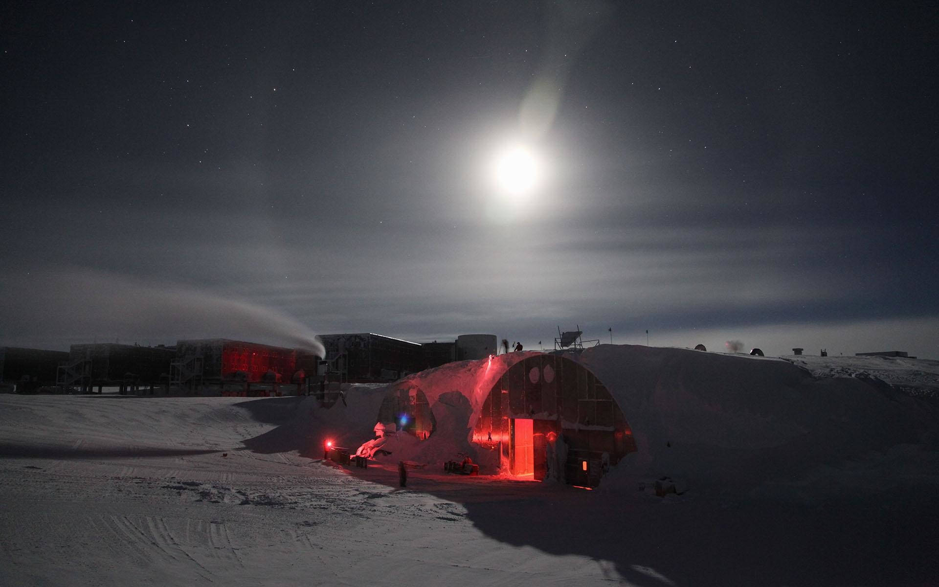 Moonlight Over A Tent In Antarctica Background