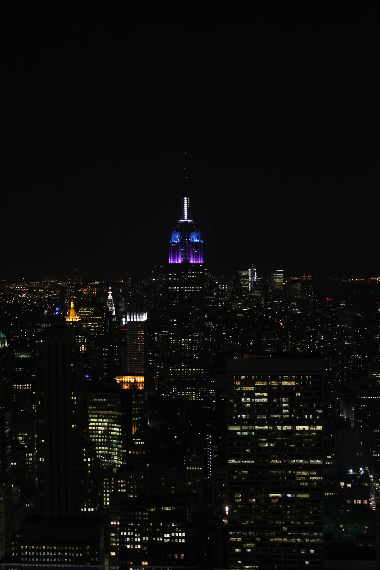 Moonlit Skyline Of The Empire State, New York At Night On Iphone Wallpaper Background