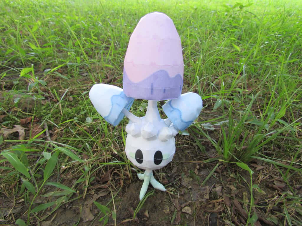 Morelull Figure On Green Grass Background