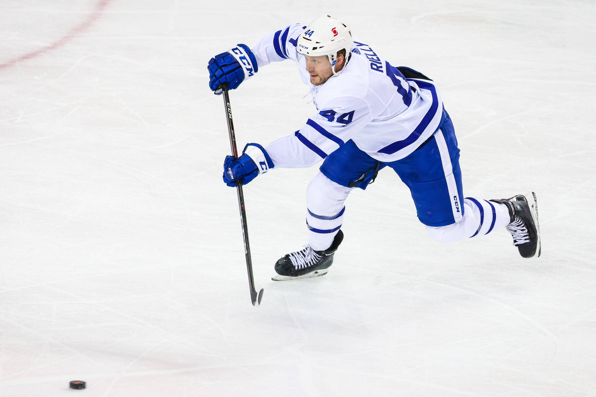 Morgan Rielly, Master Of The Puck, In Action On The Ice Background