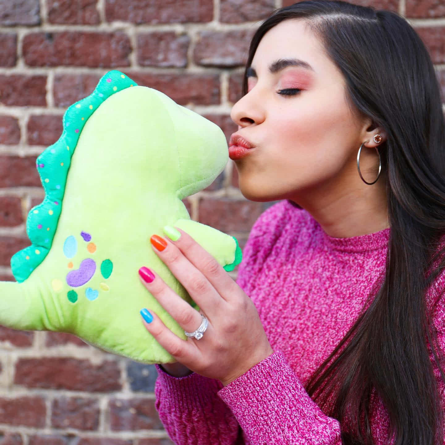 Moriah Elizabeth Kissing Dinosaur Background