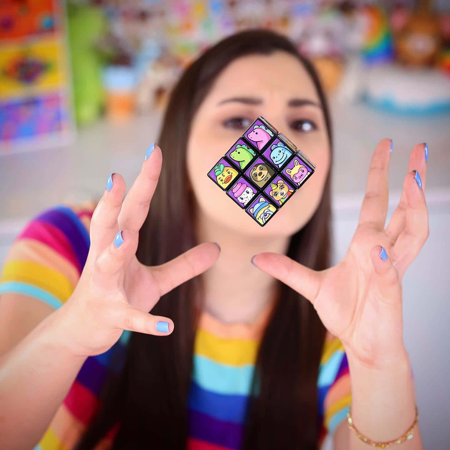 Moriah Elizabeth Throwing Rubik's Cube Background