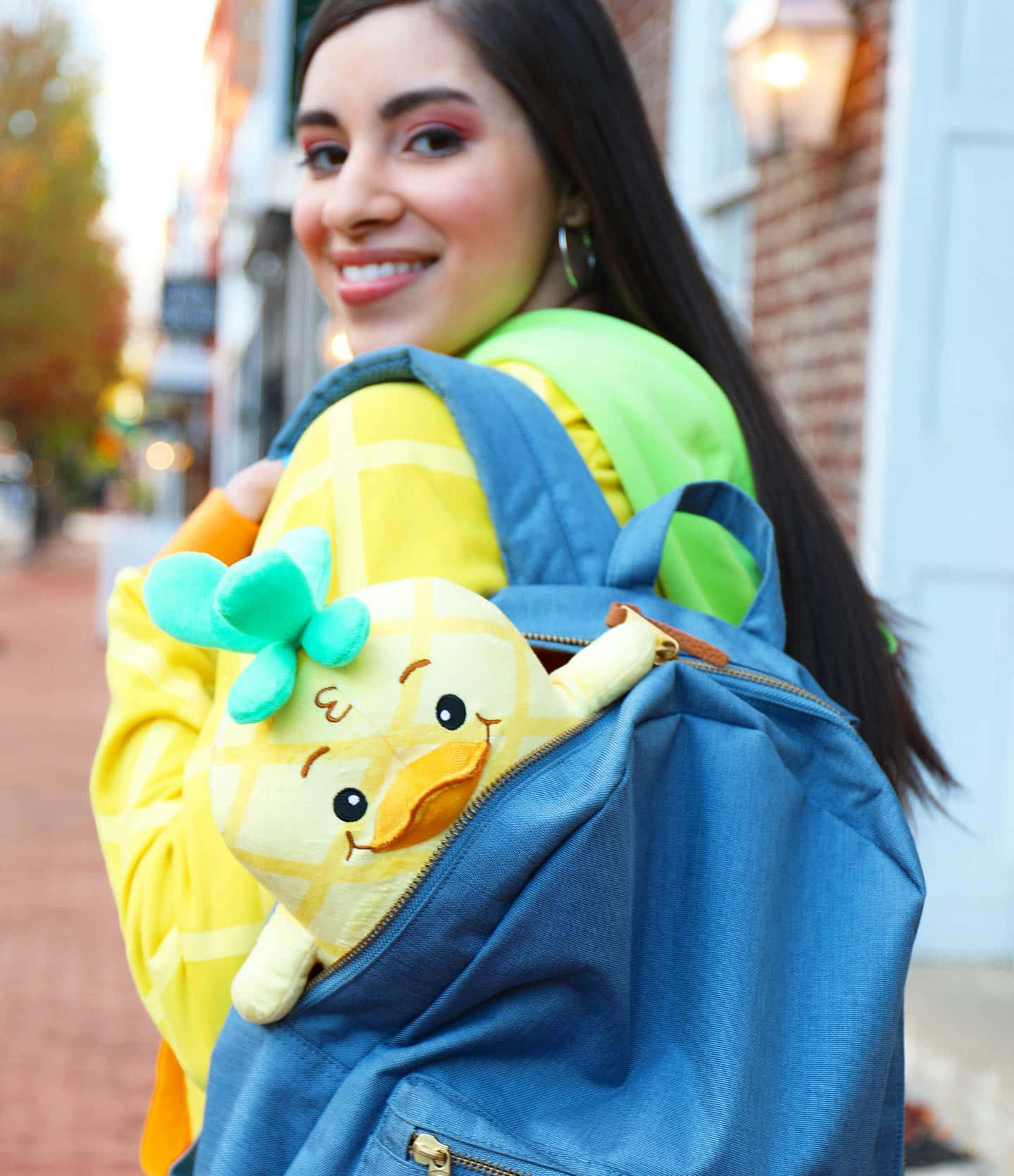 Moriah Elizabeth With Blue Backpack Background