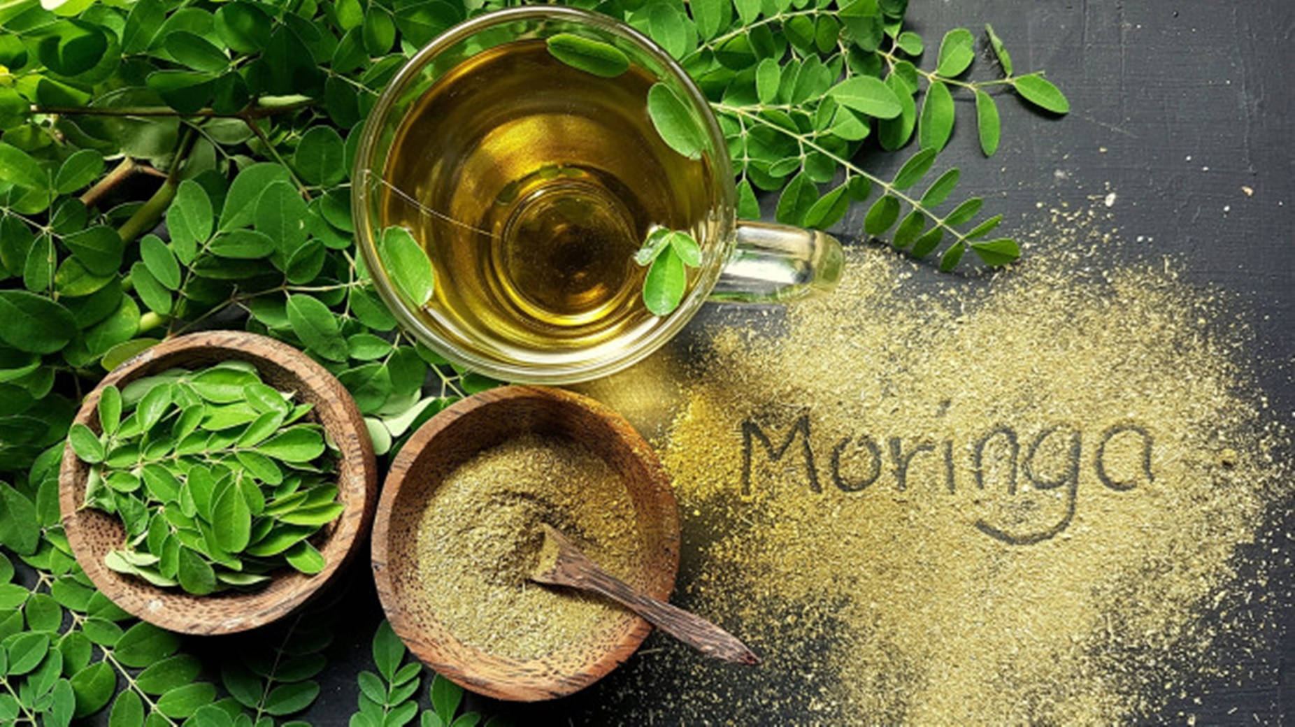 Moringa Leaves Powder And Oil Background