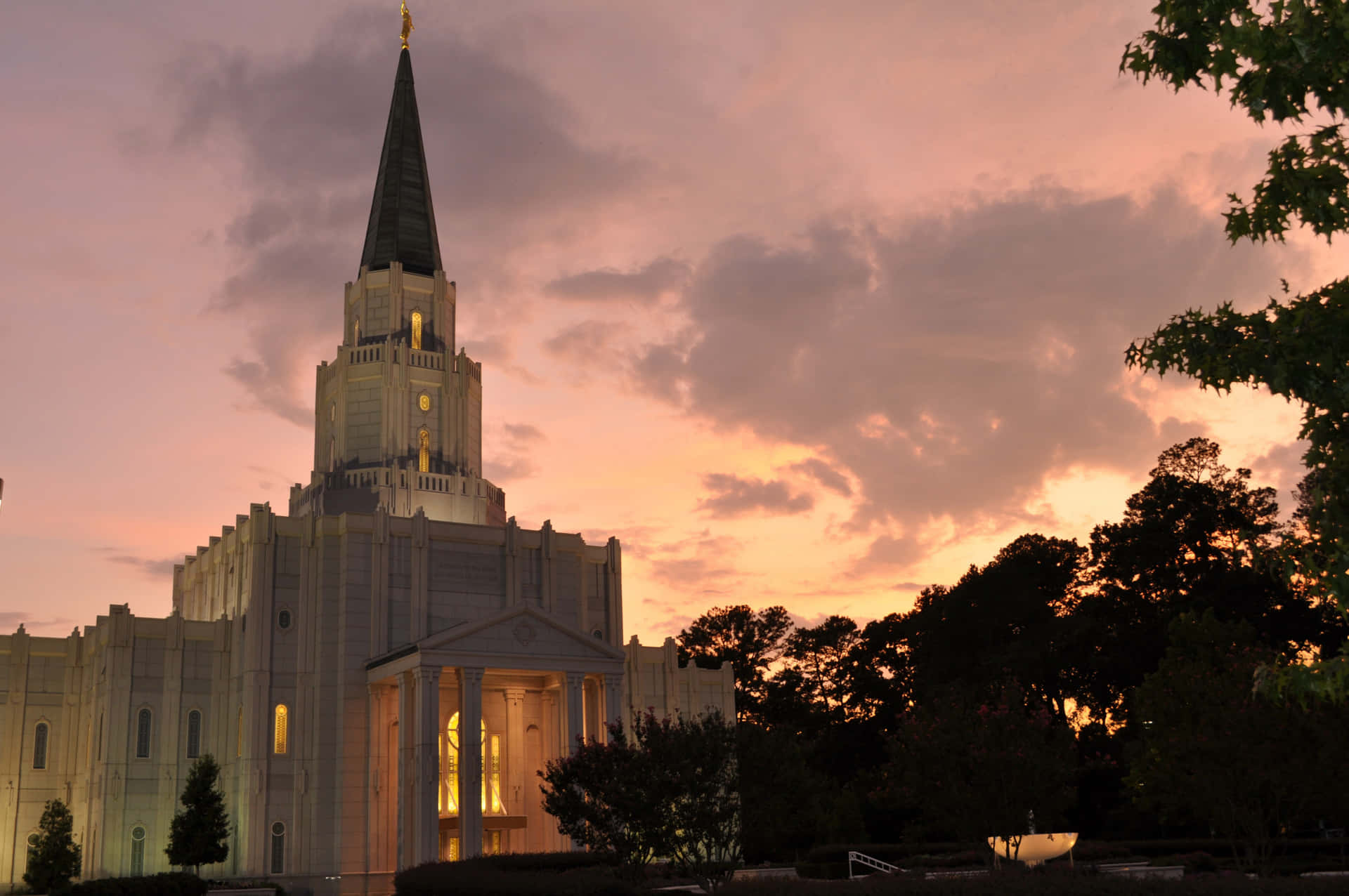 Mormon Temple Under Pink Sunset Sky Background