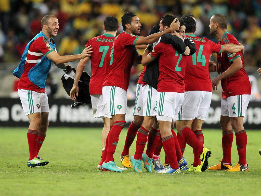 Morocco National Football Team Hugging Each Other Background