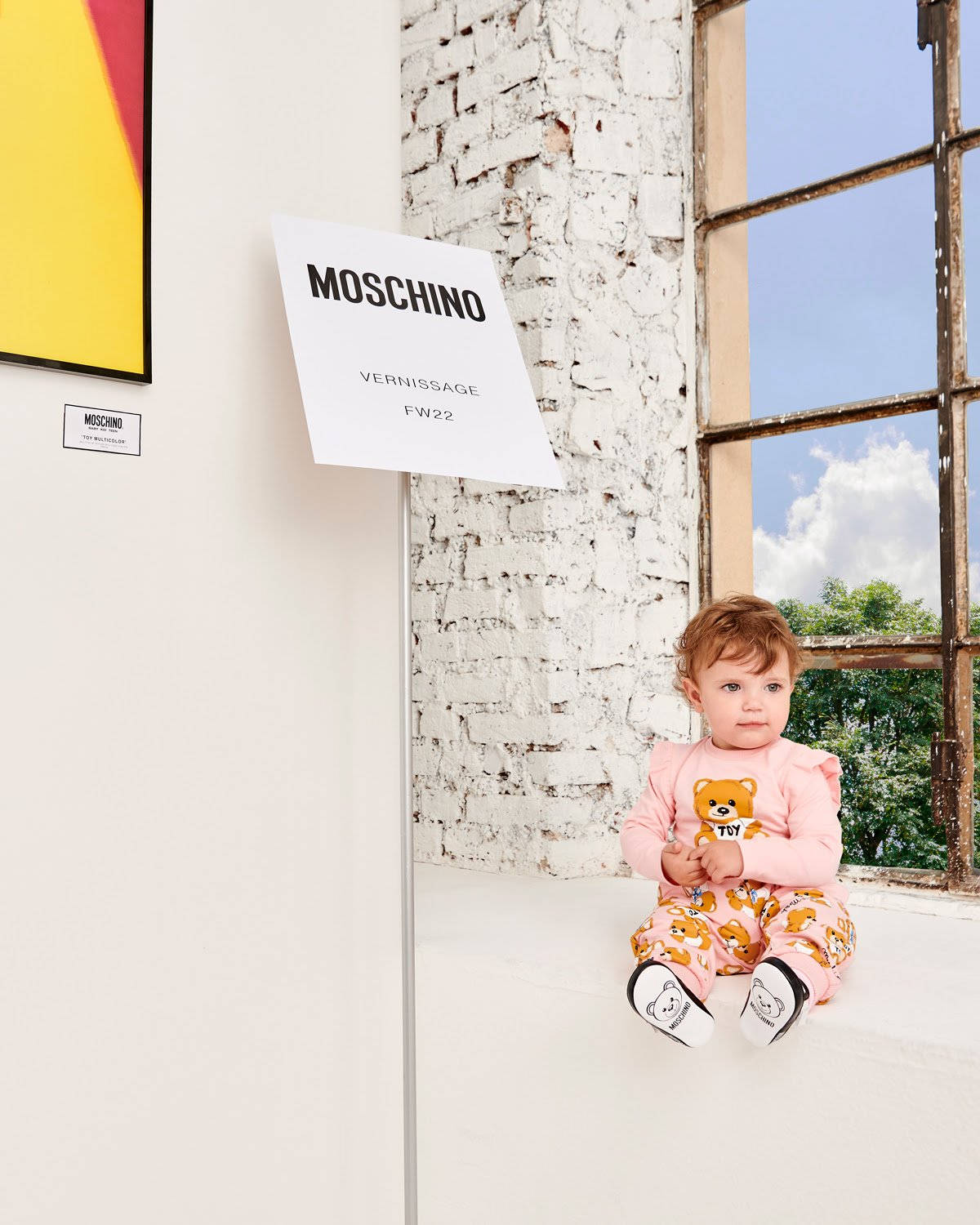 Moschino Baby By Window Background