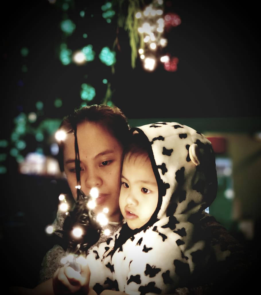 Mother And Baby With Fairy Lights