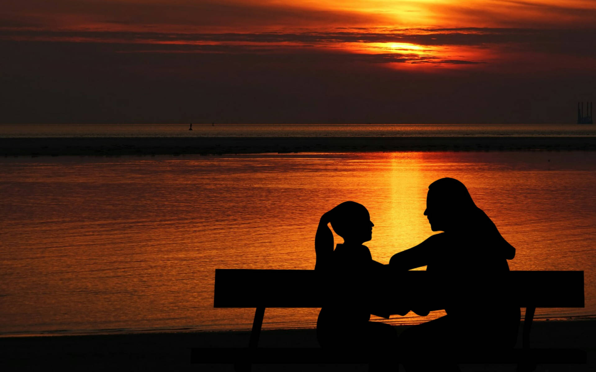 Mother And Daughter Bonding During Sunset