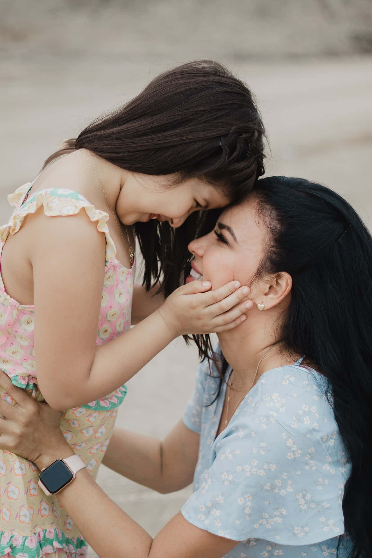 Mother And Daughter Facing Each Other Representing Tangible Love Of A Mother Background