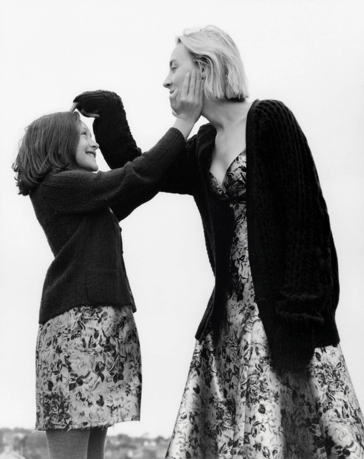 Mother And Daughter In Matching Cardigans