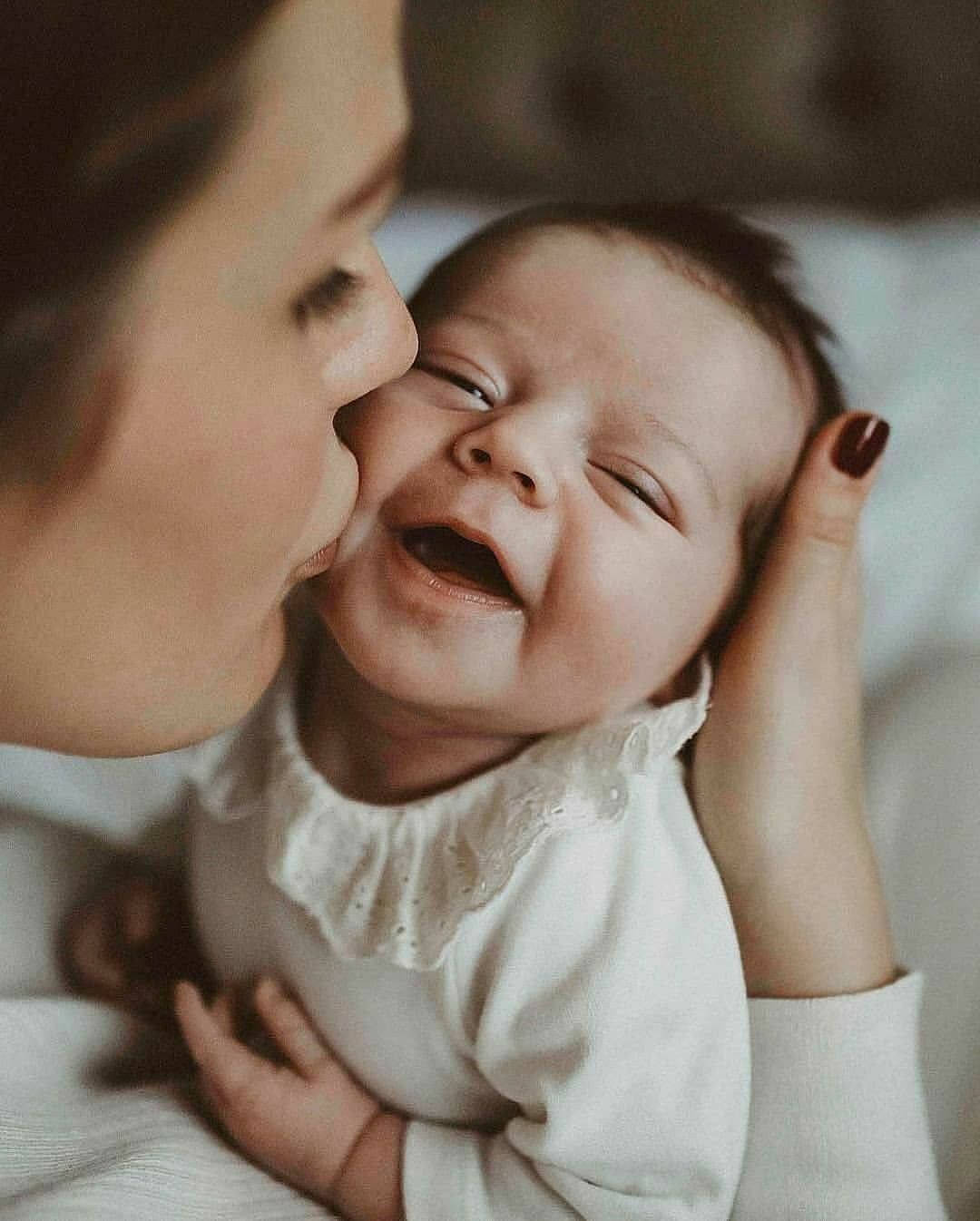 Mother And Lovely Smiling Baby Background