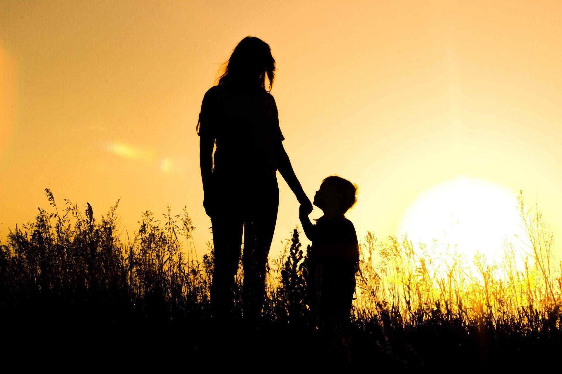 Mother And Son Sunset Silhouette Background