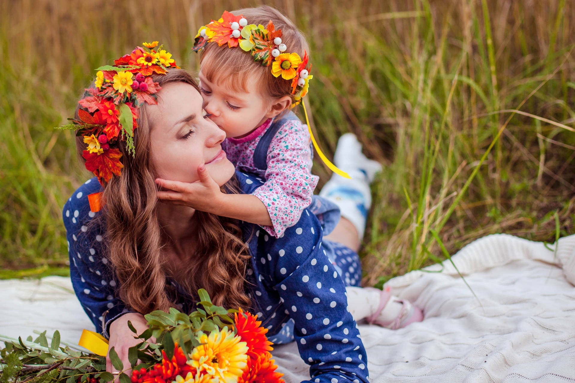 Mother And Son With Colorful Flowers