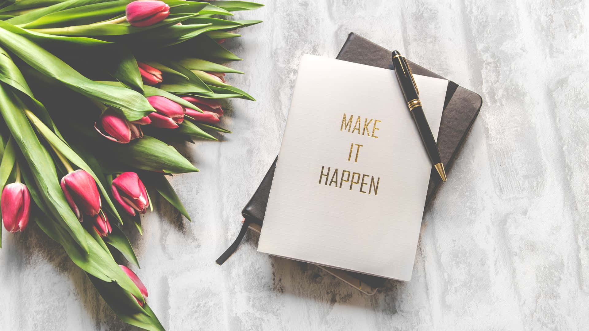 Motivational Notebookand Tulips Background