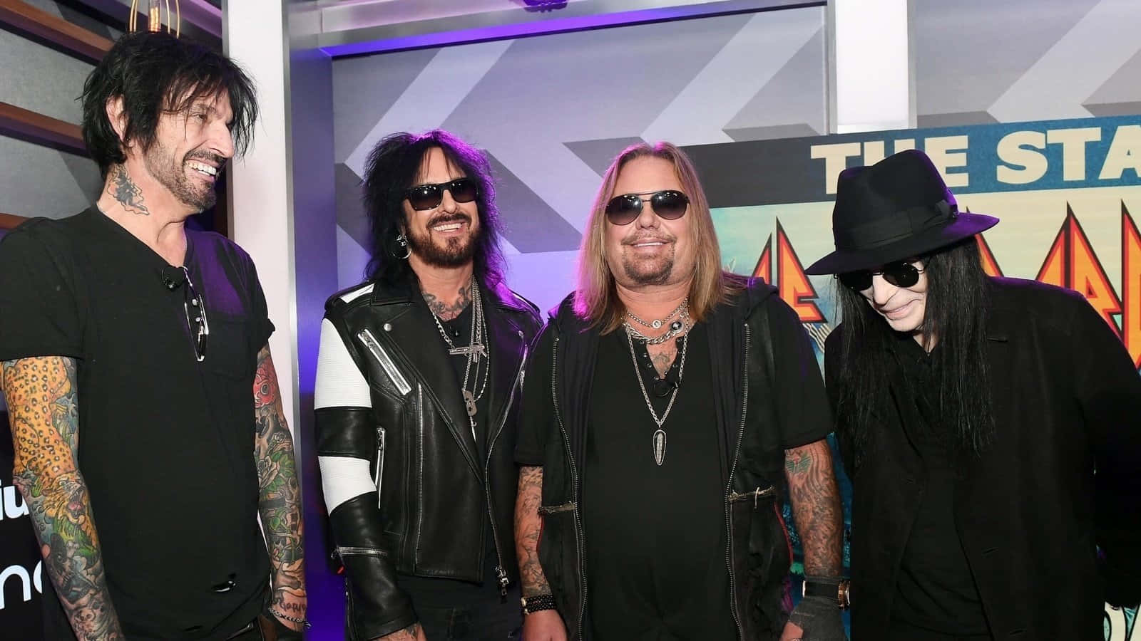 Motley Crue Rocks Their Fans With An Unforgettable Performance Background