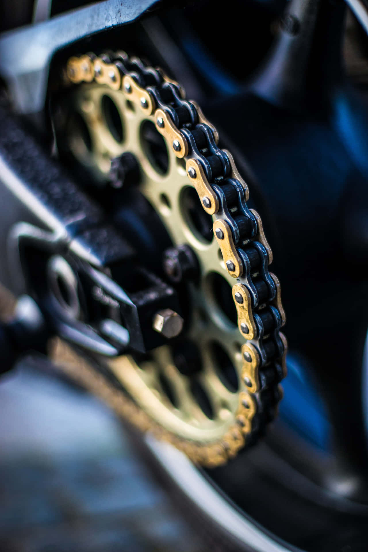 Motorcycle Chainand Sprocket Closeup Background