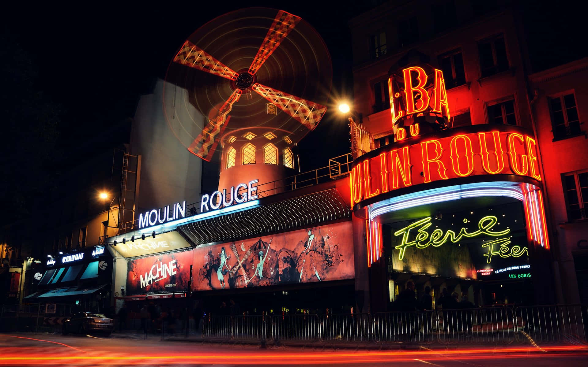 Moulin Rouge Bustling With Customers Background