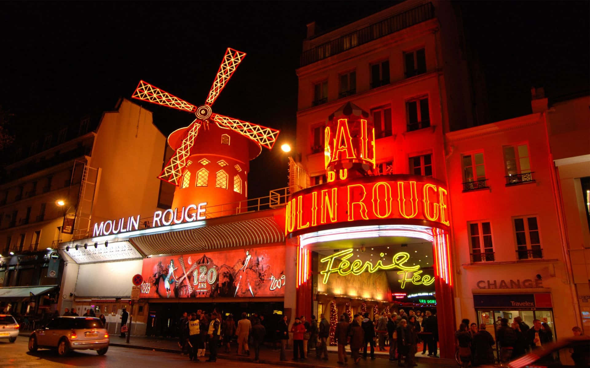 Moulin Rouge Neon Signs Busy Street Background