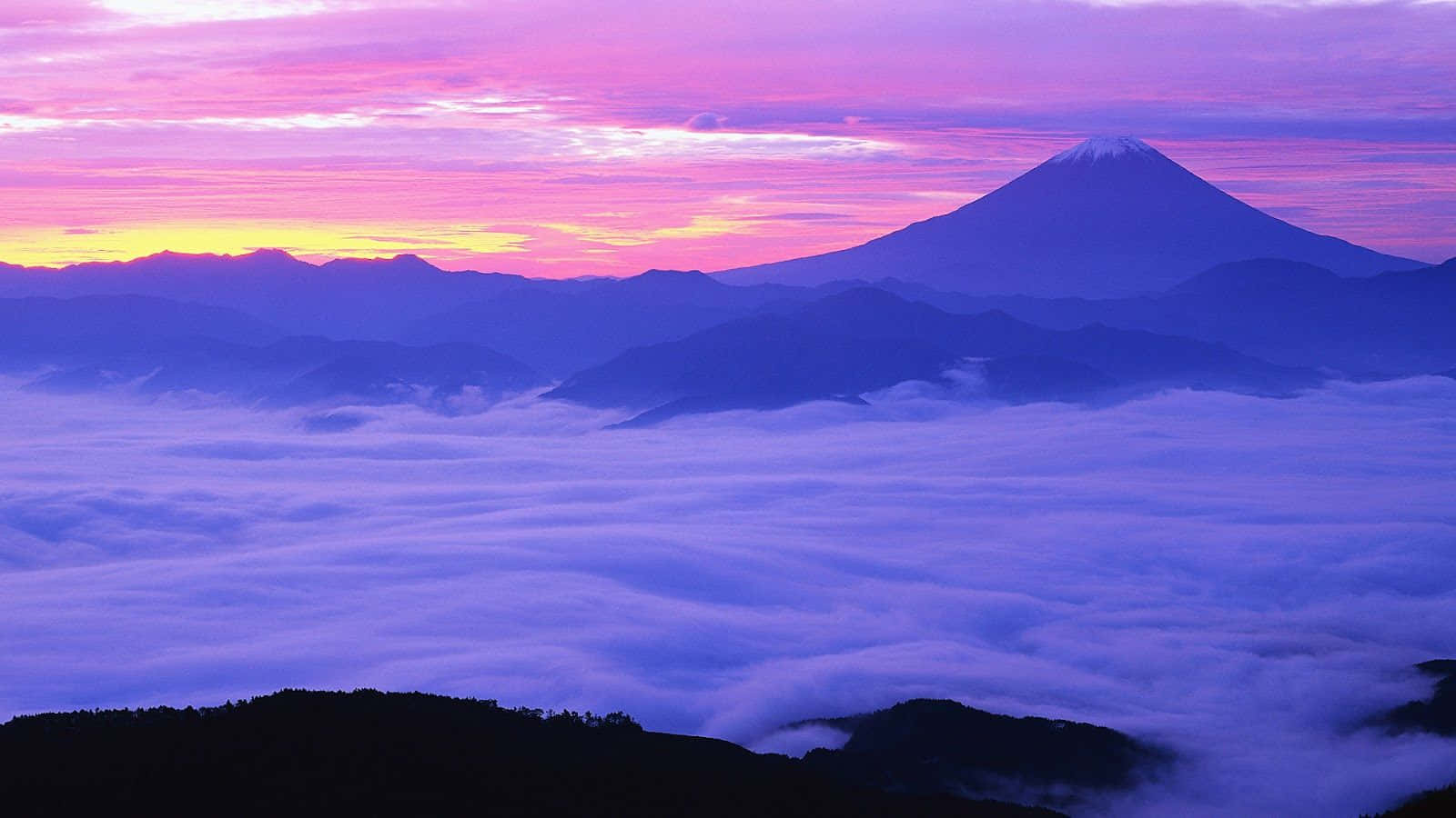 Mount Fuji Through The Clouds Background