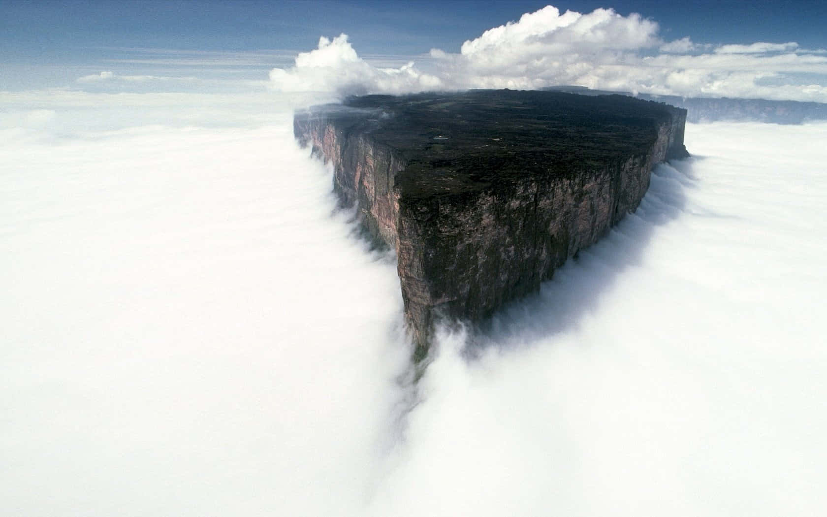 Mount Roraima Cliff And White Clouds