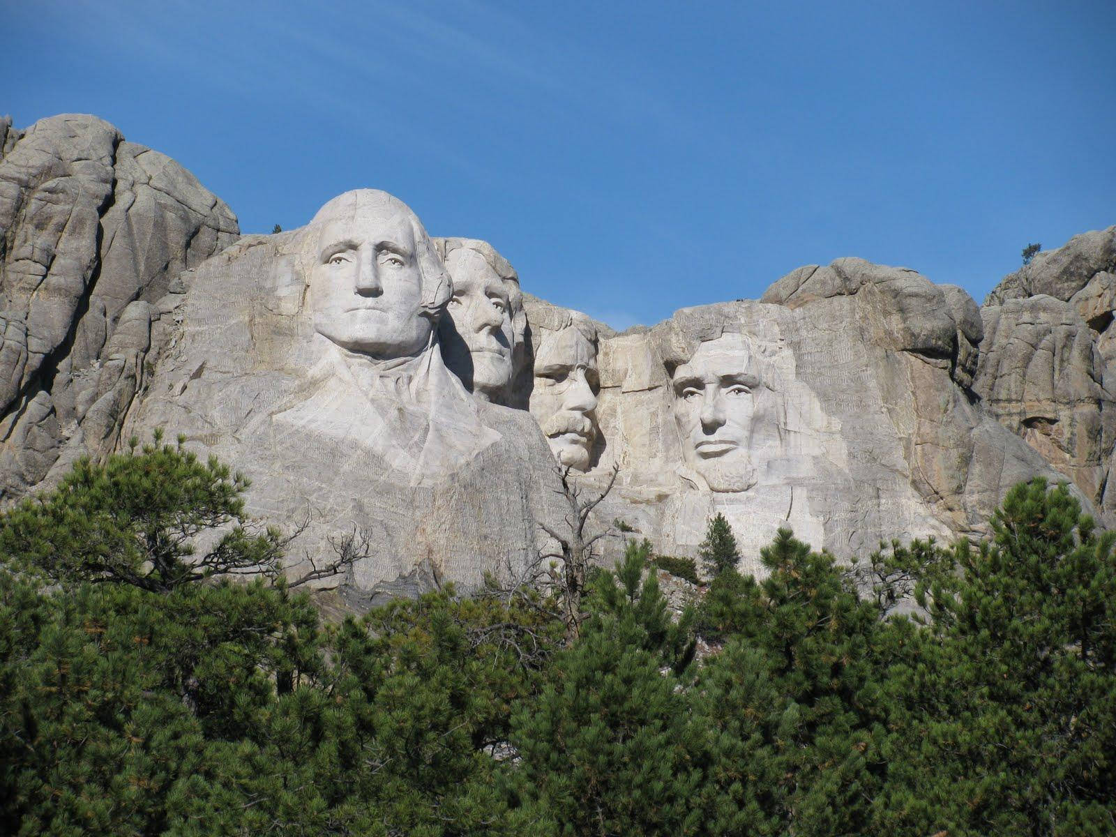 Mount Rushmore View From The Forest Background