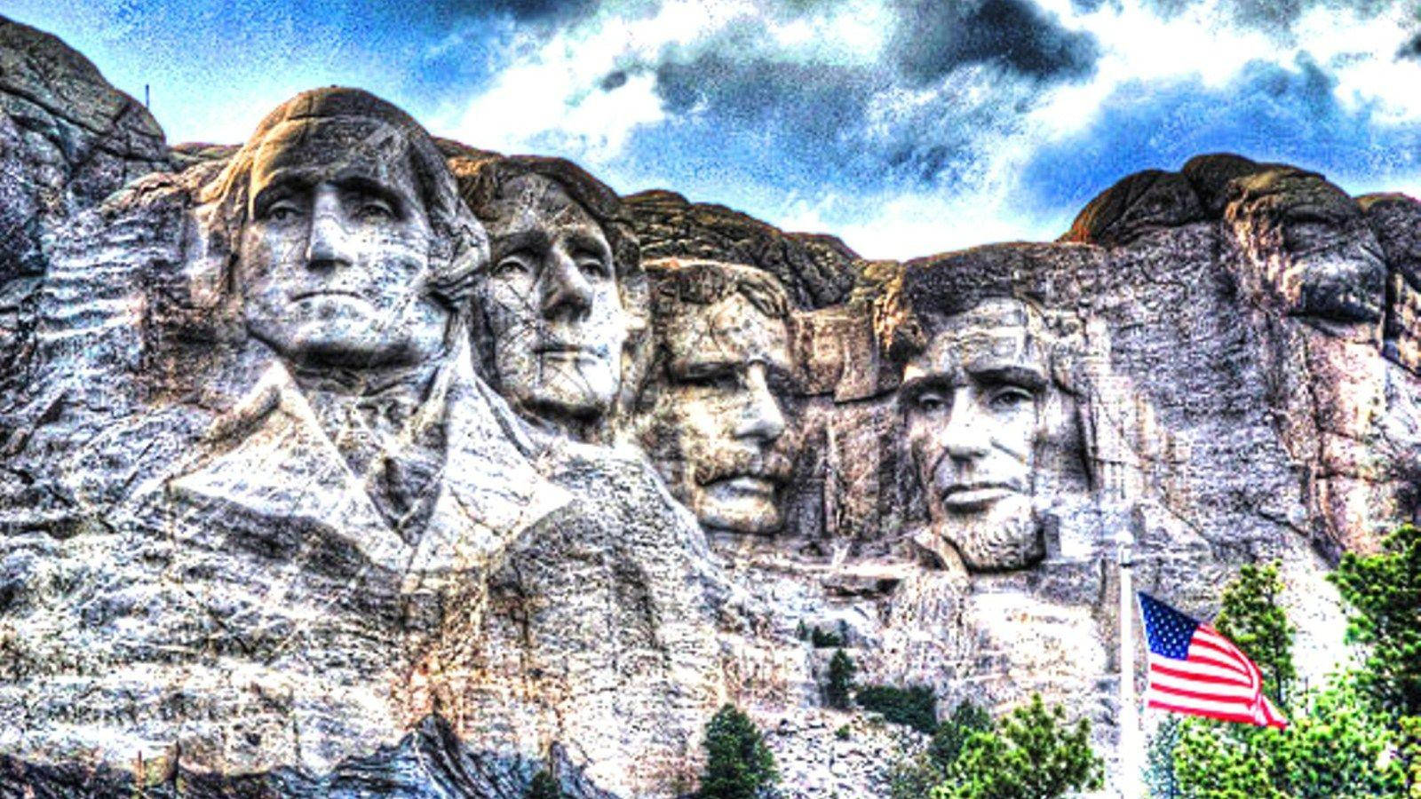 Mount Rushmore With American Flag On Pole