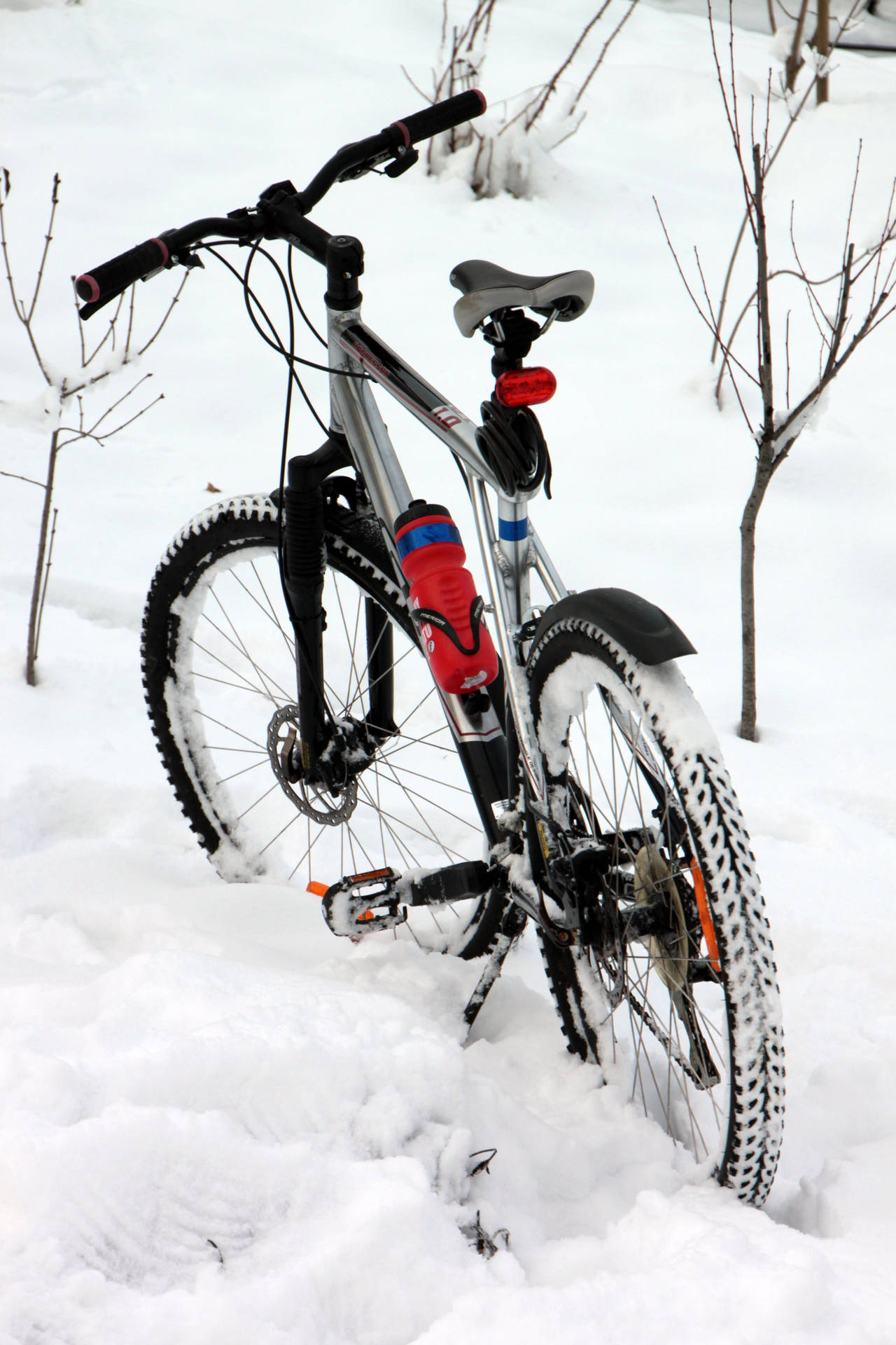 Mountain Bike At Snow Background