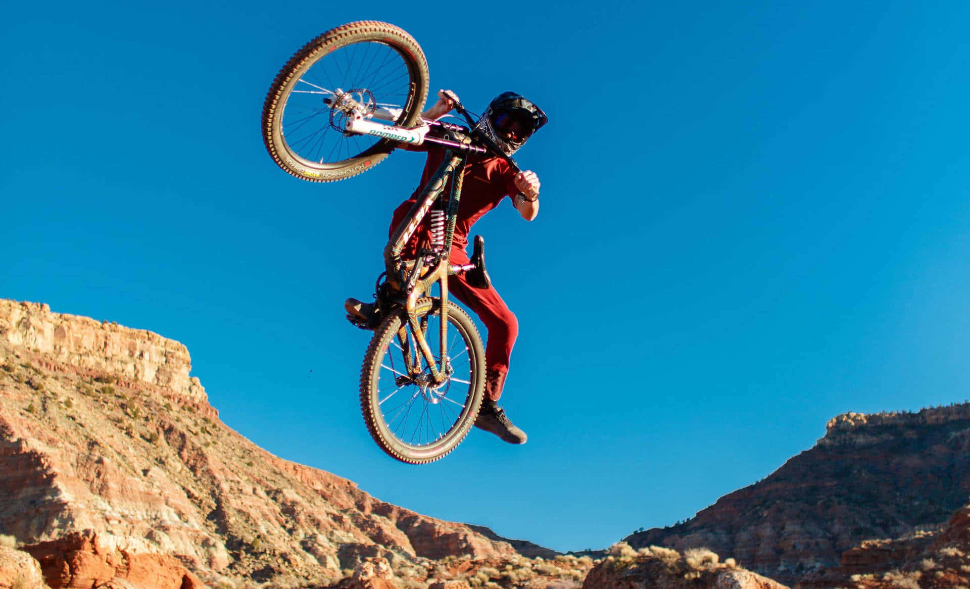 Mountain Biker Mid Air Trick Background
