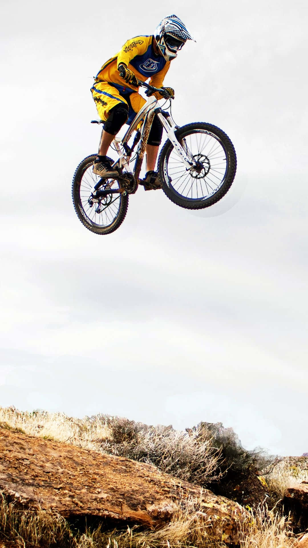 Mountain Biker Midair Jump Background