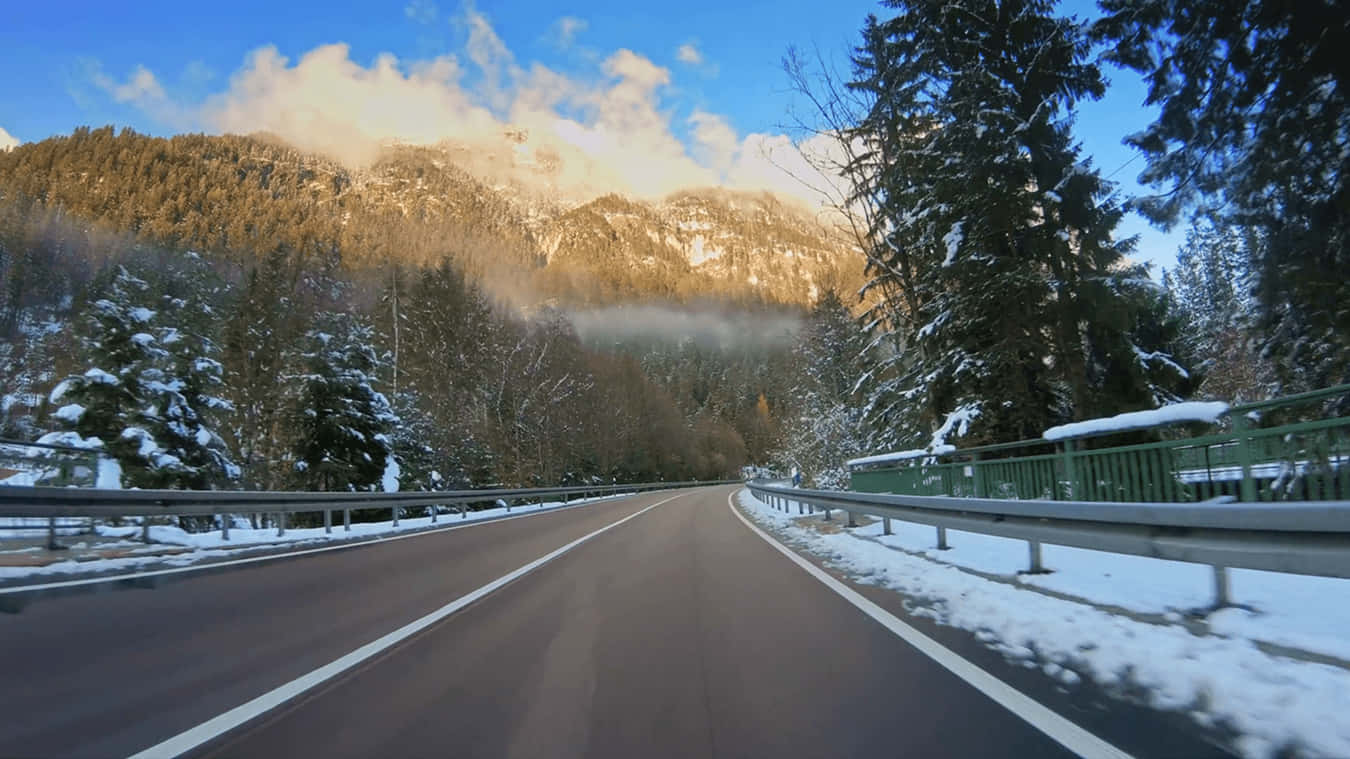 Mountain Road During The Winter Snow 4k Background