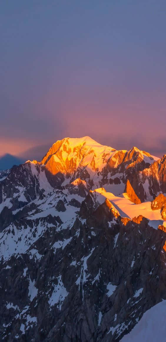 Mountain Sunset - A Magnificent Natural Wonder Background