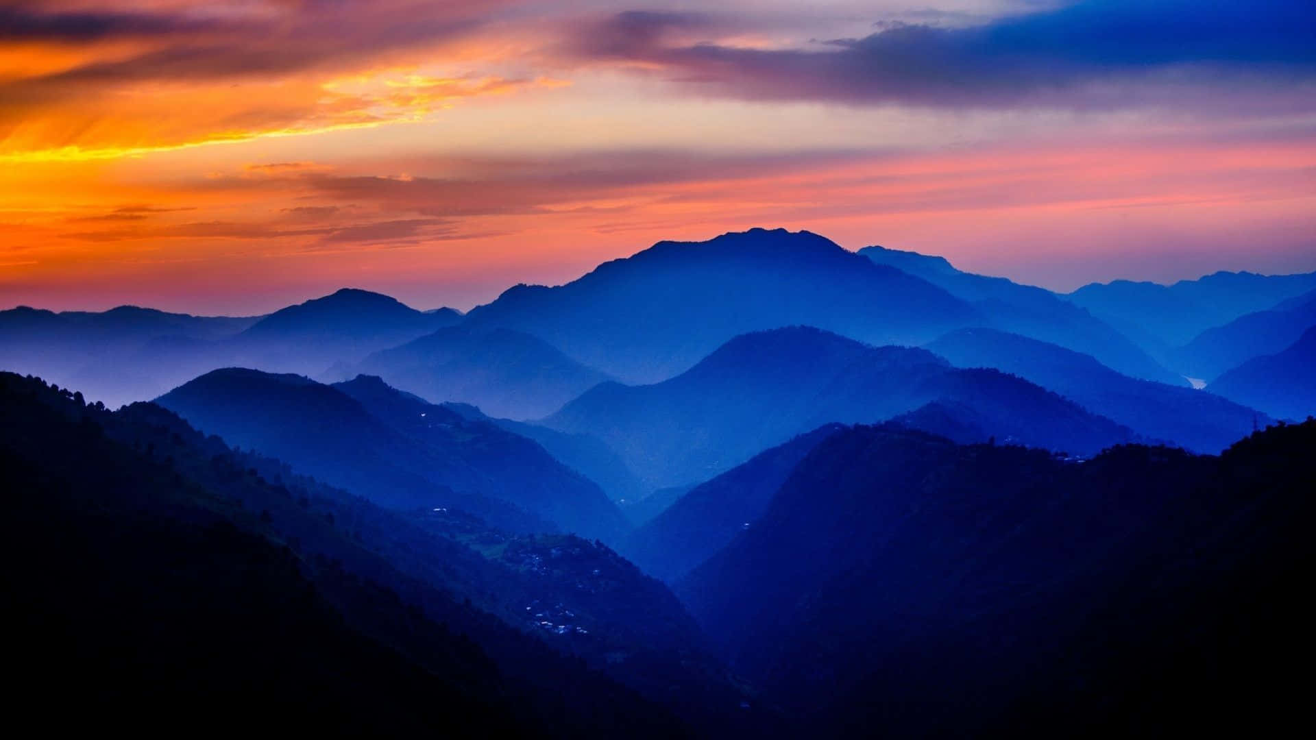 Mountains Sunset Blue And Orange Background