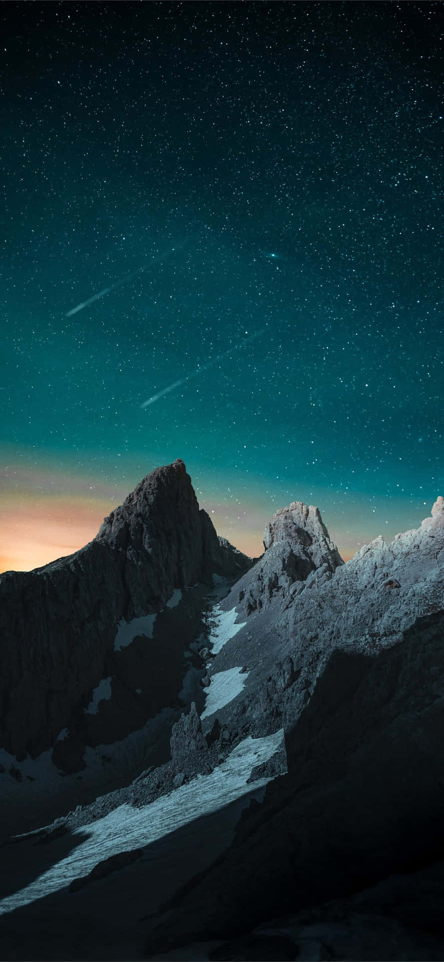 Mountains With Shooting Stars In Evening Sky